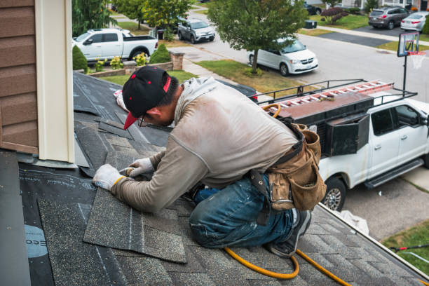 Professional Roofing technician working in New Glarus, WI